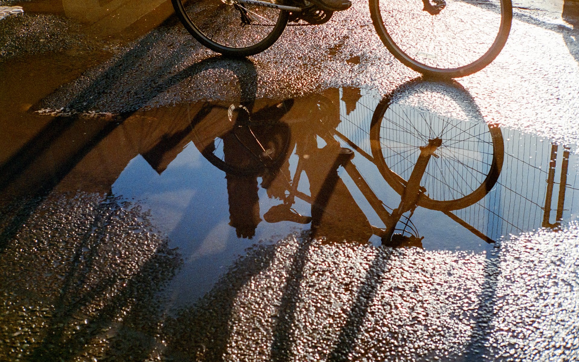 Picture of a bicycle reflection in a puddle